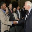 Rt Hon Davis Johnson greets the team